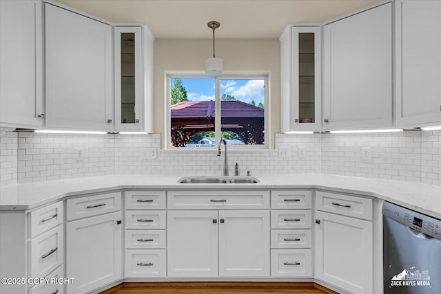 10201 Sextant Cir, Anchorage, AK 99515 - kitchen with stainless steel dishwasher, a sink, and white cabinets