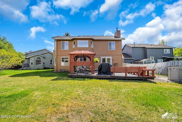 10201 Sextant Cir, Anchorage, AK 99515 - rear view of property featuring a gazebo, a wooden deck, and a chimney