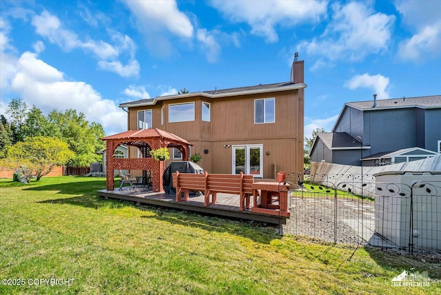 10201 Sextant Cir, Anchorage, AK 99515 - back of house featuring a gazebo, a deck, and a chimney