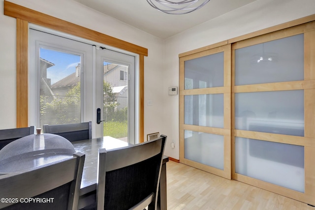 4160 Crannog St, Anchorage, AK 99502 - dining space featuring light wood-type flooring and healthy amount of natural light
