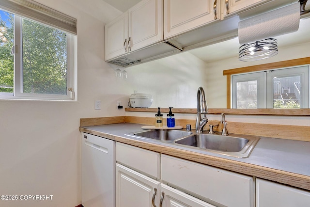 4160 Crannog St, Anchorage, AK 99502 - kitchen featuring dishwasher, a sink, white cabinetry, and light countertops