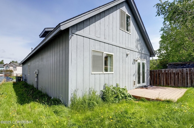 4160 Crannog St, Anchorage, AK 99502 - view of side of property featuring a deck and french doors