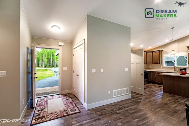4124 N Coronado St, Wasilla, AK 99623 - foyer featuring vaulted ceiling, dark wood-style flooring, and recessed lighting