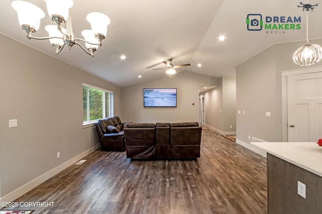 4124 N Coronado St, Wasilla, AK 99623 - living area featuring a chandelier, vaulted ceiling, dark wood-type flooring, ceiling fan, and recessed lighting