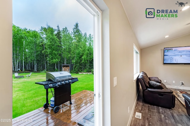 4124 N Coronado St, Wasilla, AK 99623 - wooden terrace with area for grilling and a lawn