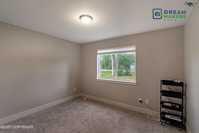 4124 N Coronado St, Wasilla, AK 99623 - spare room with baseboards and carpet