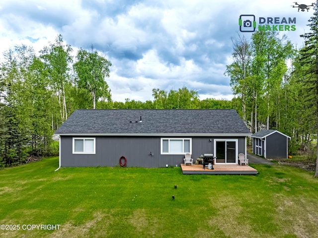 4124 N Coronado St, Wasilla, AK 99623 - back of house with a wooden deck, a yard, a storage shed, and roof with shingles