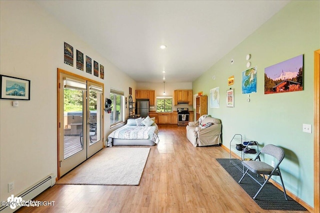 32879 Shorebird Ln, Anchor Point, AK 99556 - living area featuring light wood-style flooring, baseboards, recessed lighting, a baseboard heating unit, and french doors