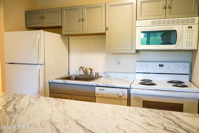 2100 Minerva Way # A6, Anchorage, AK 99515 - kitchen with white appliances, a sink, light stone counters, and gray cabinetry