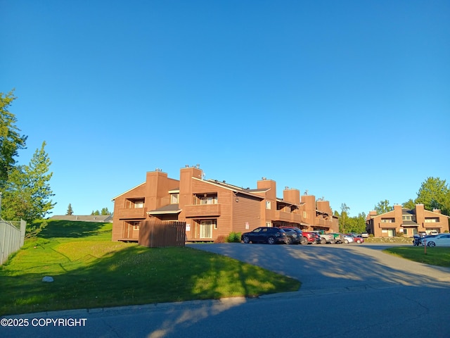 2100 Minerva Way # A6, Anchorage, AK 99515 - view of building exterior with uncovered parking