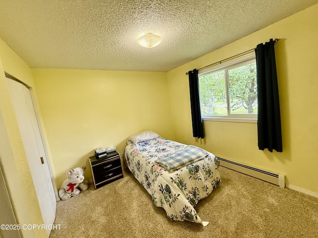 4941 E Rhubarb Cir, Wasilla, AK 99654 - bedroom with a baseboard heating unit, carpet floors, and a textured ceiling