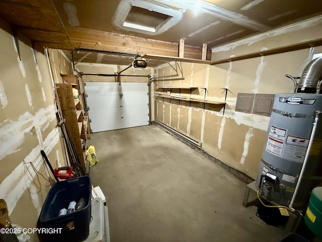 4941 E Rhubarb Cir, Wasilla, AK 99654 - garage featuring strapped water heater and a garage door opener