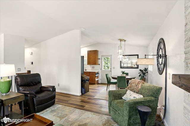 6911 Cheryl St, Anchorage, AK 99518 - living room featuring dark wood finished floors, vaulted ceiling, a chandelier, and baseboards