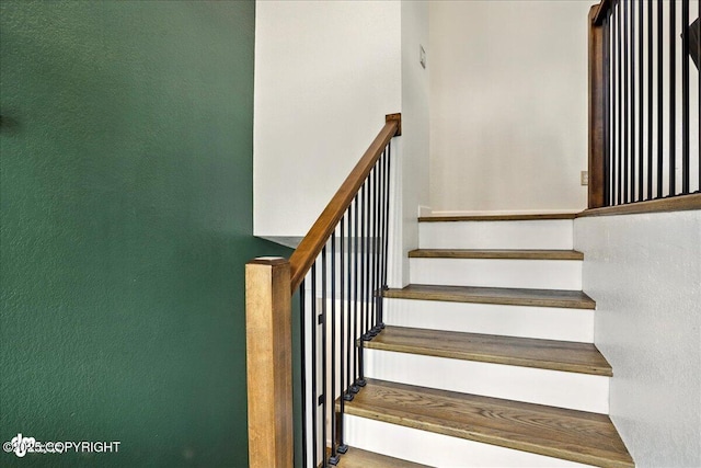6911 Cheryl St, Anchorage, AK 99518 - stairs featuring a textured wall