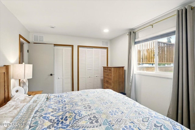 6911 Cheryl St, Anchorage, AK 99518 - bedroom featuring two closets