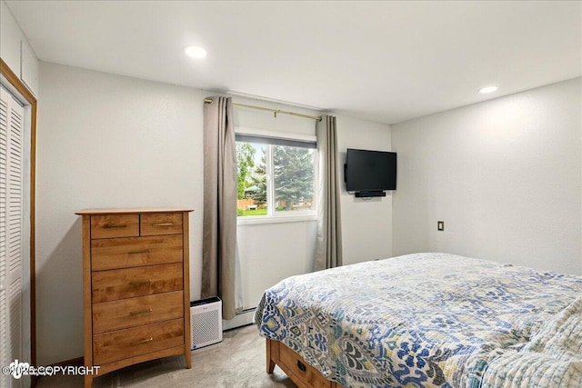 6911 Cheryl St, Anchorage, AK 99518 - bedroom featuring light carpet, recessed lighting, and a closet