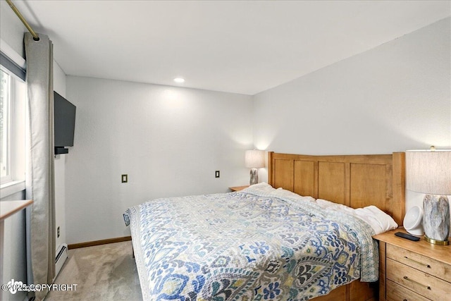 6911 Cheryl St, Anchorage, AK 99518 - bedroom featuring light carpet, a baseboard heating unit, and baseboards