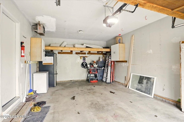 6911 Cheryl St, Anchorage, AK 99518 - garage featuring a garage door opener