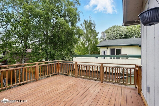 6911 Cheryl St, Anchorage, AK 99518 - deck with view of scattered trees