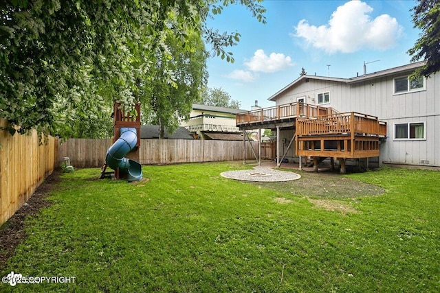 6911 Cheryl St, Anchorage, AK 99518 - view of yard featuring a deck, a playground, and stairs