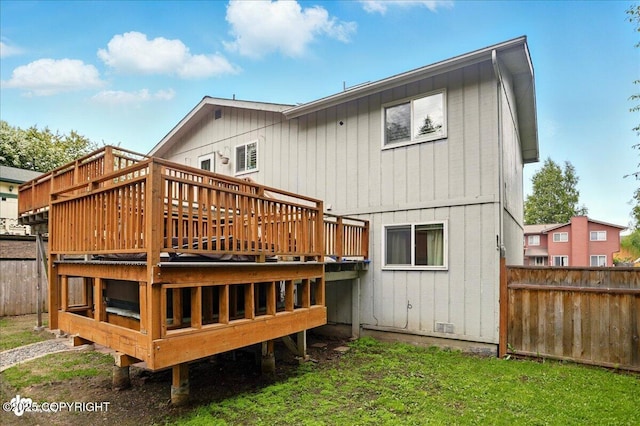 6911 Cheryl St, Anchorage, AK 99518 - rear view of house with a wooden deck