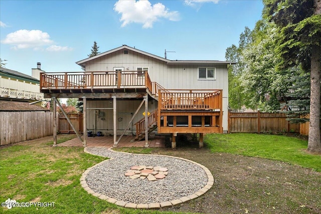 6911 Cheryl St, Anchorage, AK 99518 - rear view of house with a deck and stairs