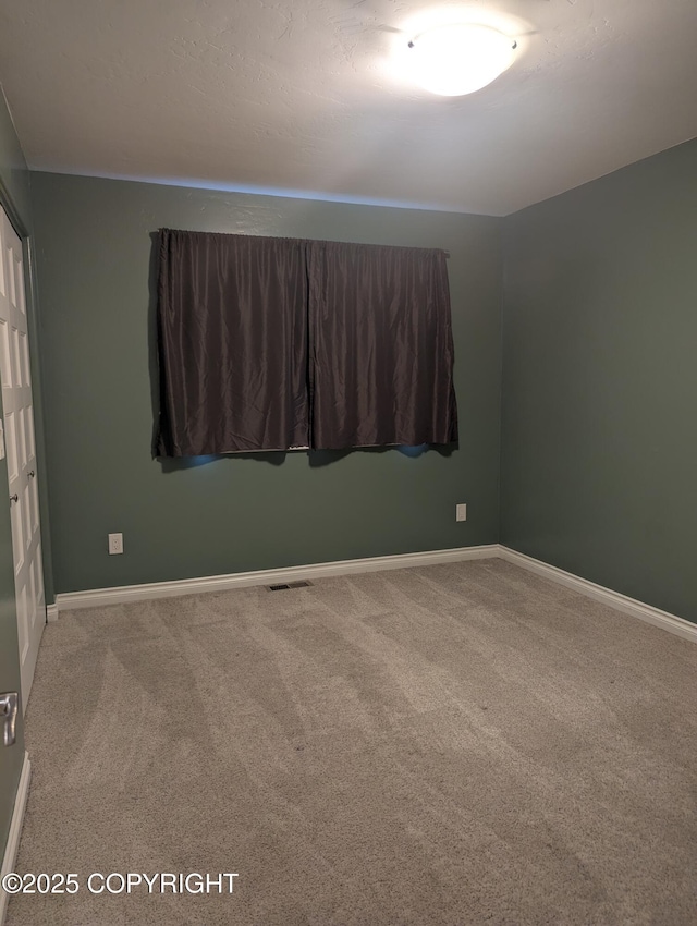 7324 Zurich St, Anchorage, AK 99507 - spare room with carpet and baseboards