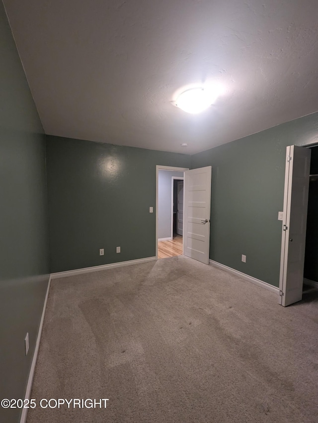 7324 Zurich St, Anchorage, AK 99507 - empty room featuring light colored carpet and baseboards