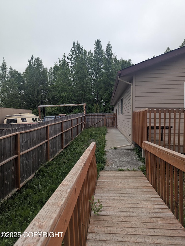 7324 Zurich St, Anchorage, AK 99507 - wooden terrace with a fenced backyard