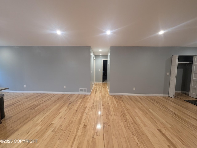 7324 Zurich St, Anchorage, AK 99507 - unfurnished room featuring light wood-style floors, baseboards, and recessed lighting