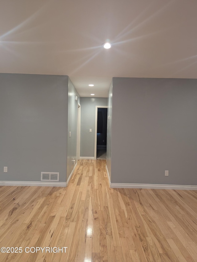 7324 Zurich St, Anchorage, AK 99507 - spare room featuring hardwood / wood-style floors, recessed lighting, and baseboards