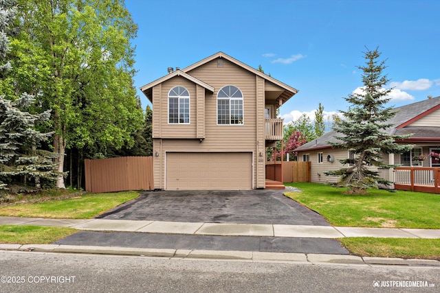2353 Maritime Loop, Anchorage, AK 99515 - traditional home with an attached garage and asphalt driveway