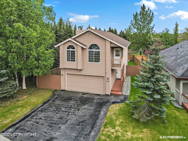 2353 Maritime Loop, Anchorage, AK 99515 - view of front of house featuring asphalt driveway and an attached garage