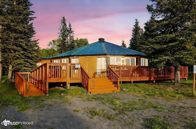 13364 Sterling Hwy, Ninilchik, AK 99639 - back of property at dusk featuring a deck and metal roof