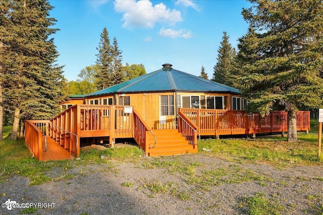 13364 Sterling Hwy, Ninilchik, AK 99639 - back of property with a deck and metal roof