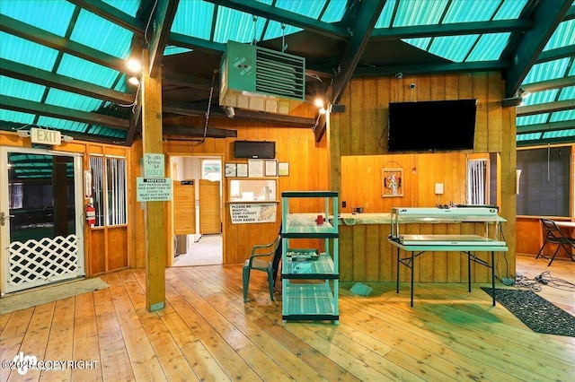13364 Sterling Hwy, Ninilchik, AK 99639 - misc room with wooden walls, a heating unit, and wood-type flooring
