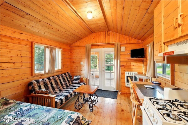 13364 Sterling Hwy, Ninilchik, AK 99639 - bedroom featuring vaulted ceiling, wooden ceiling, light wood finished floors, access to exterior, and heating unit