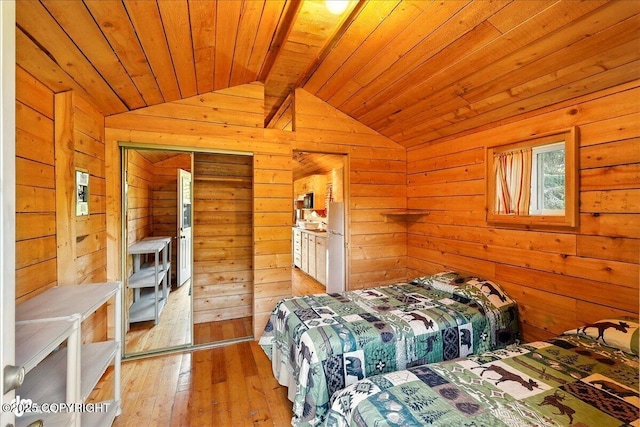 13364 Sterling Hwy, Ninilchik, AK 99639 - bedroom featuring wood walls, wooden ceiling, and light wood finished floors