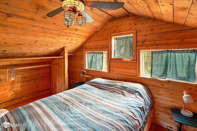 13364 Sterling Hwy, Ninilchik, AK 99639 - bedroom featuring lofted ceiling, multiple windows, wood walls, wooden ceiling, and a ceiling fan