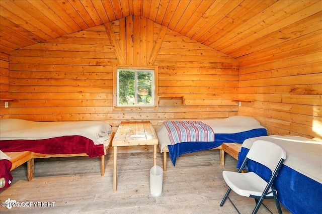 13364 Sterling Hwy, Ninilchik, AK 99639 - bedroom with a sauna, lofted ceiling, wood ceiling, hardwood / wood-style flooring, and wooden walls