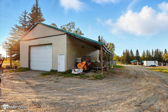 13364 Sterling Hwy, Ninilchik, AK 99639 - garage with driveway and a garage