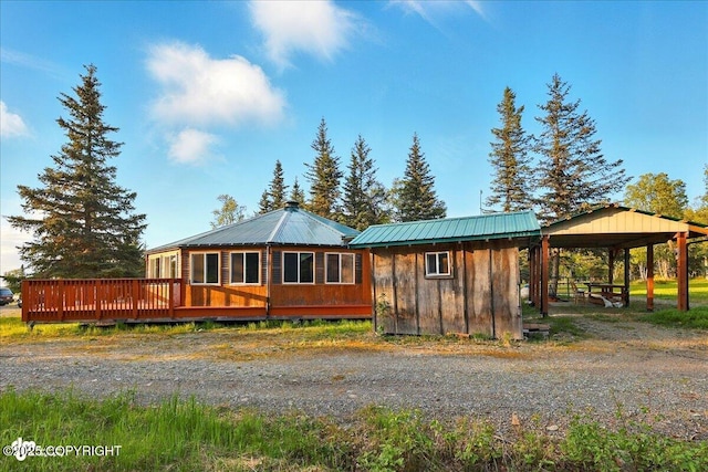 13364 Sterling Hwy, Ninilchik, AK 99639 - view of front of property featuring a wooden deck, metal roof, an outbuilding, and a gazebo