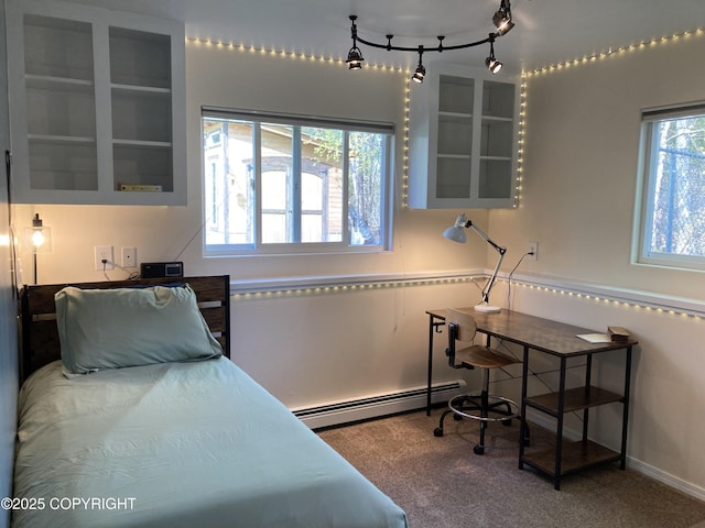 22909 Green Garden Dr, Chugiak, AK 99567 - carpeted bedroom with baseboard heating