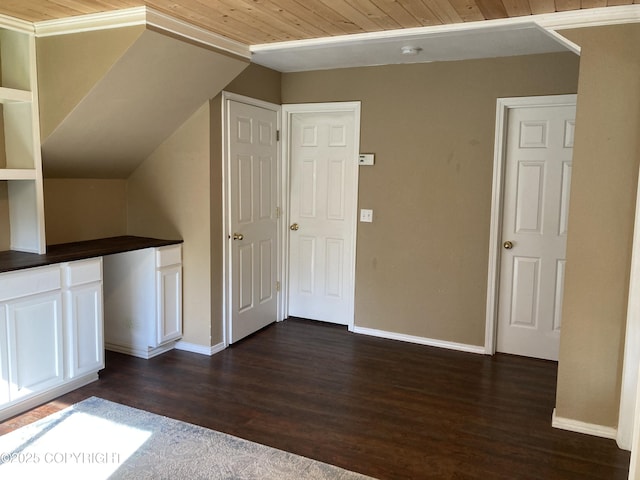 22909 Green Garden Dr, Chugiak, AK 99567 - additional living space with wood ceiling, dark wood finished floors, and baseboards