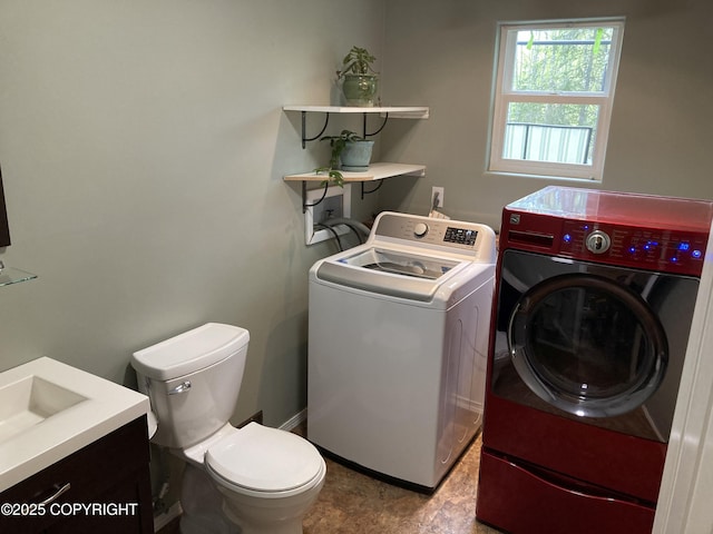 22909 Green Garden Dr, Chugiak, AK 99567 - laundry area featuring washing machine and dryer