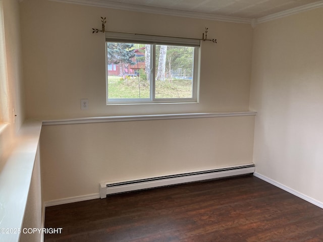 22909 Green Garden Dr, Chugiak, AK 99567 - unfurnished room featuring baseboard heating, dark wood-style flooring, ornamental molding, and baseboards