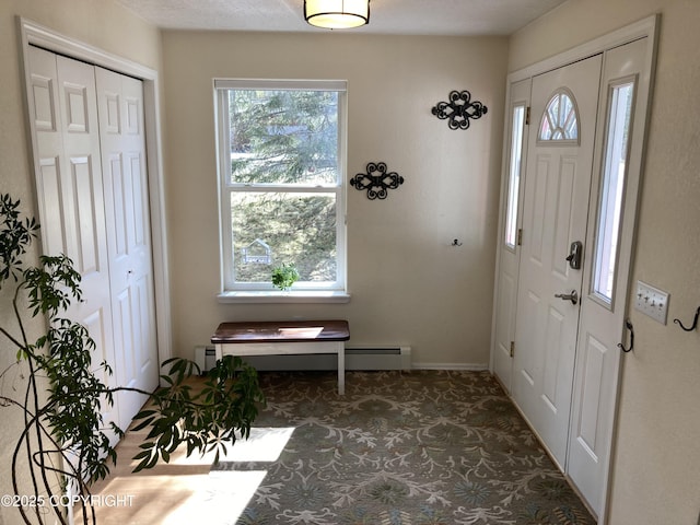 22909 Green Garden Dr, Chugiak, AK 99567 - carpeted entrance foyer featuring baseboards