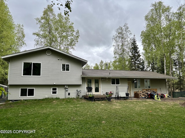 22909 Green Garden Dr, Chugiak, AK 99567 - rear view of property featuring a yard