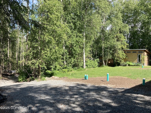 22909 Green Garden Dr, Chugiak, AK 99567 - surrounding community featuring a lawn