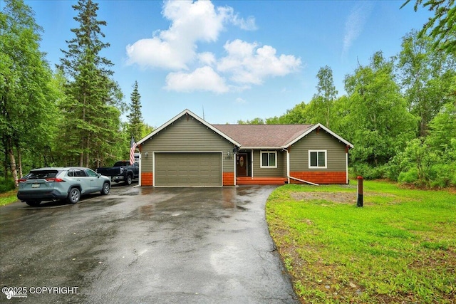 2700 S Hatcher Pass St, Wasilla, AK 99623 - single story home with a garage, driveway, and a front yard